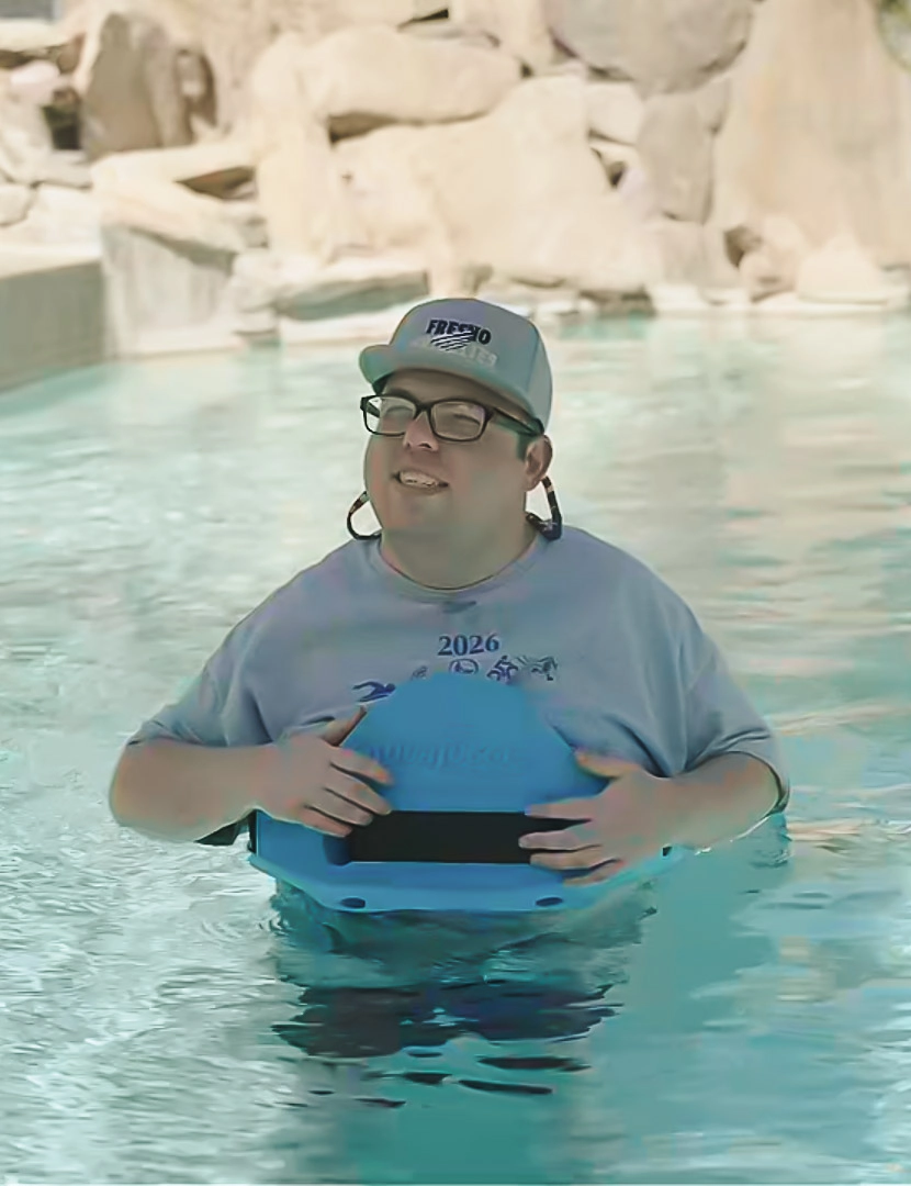 Safe Harbor Resident Enjoying Pool Activities Safe Harbor resident participating in a recreational pool activity.